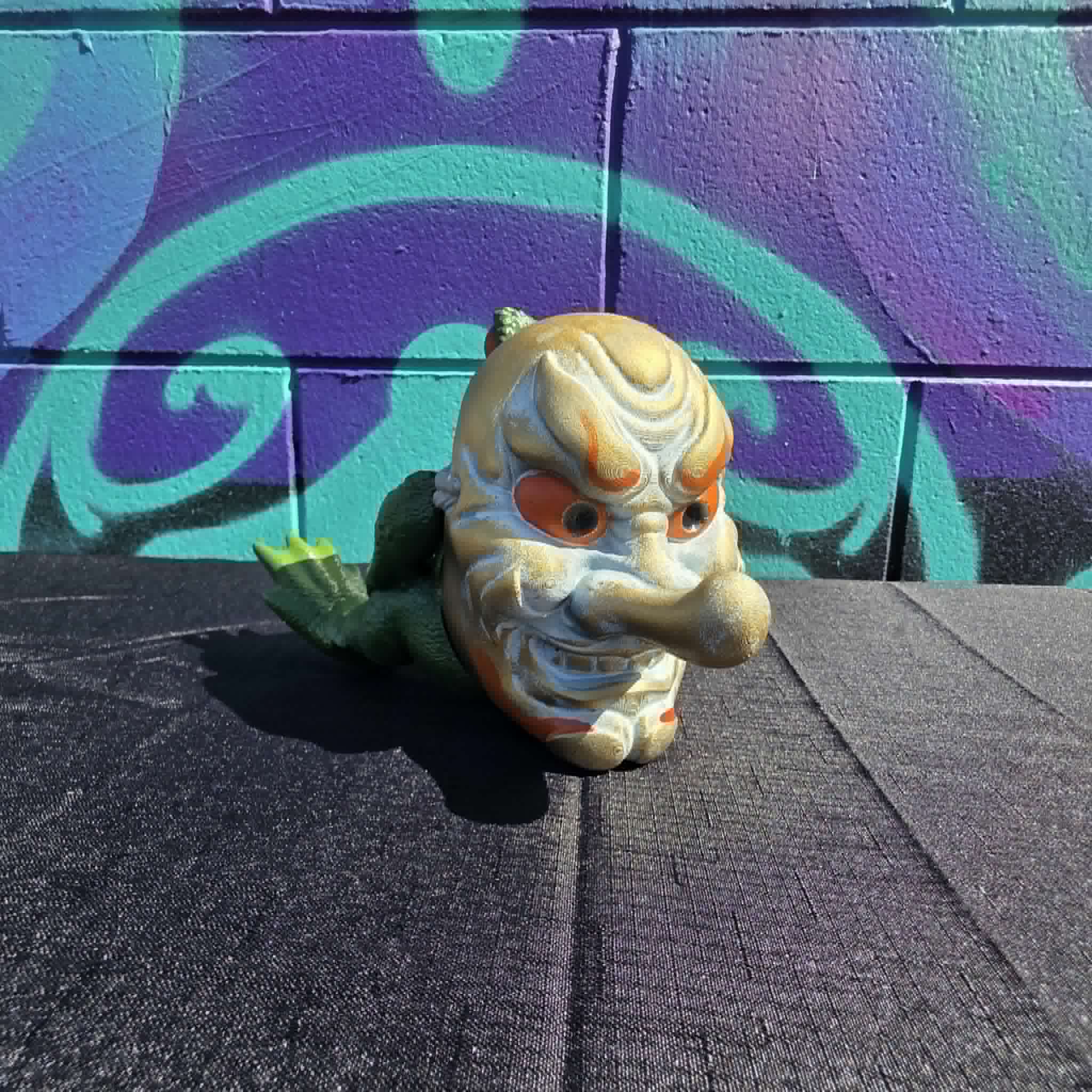 Pipe-Smoking Toad with Tengu Mask Statue